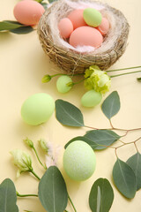Composition with beautiful Easter eggs on color background