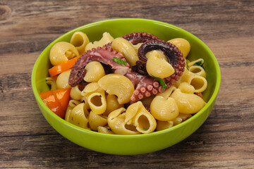 Pasta with octopus and yellow tomatoes