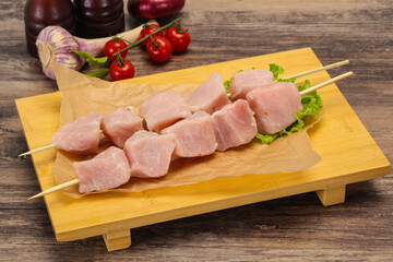 Raw pork meat skewer for grill