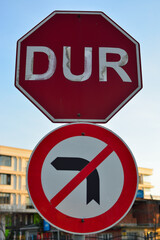 Traffic sign. Stop and no turn left.