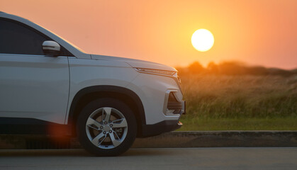 SUV Car parked on road sunset background and Car travel on road trip