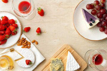Beautiful composition with strawberry, grapes, cheese and blueberry cheesecake