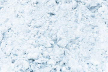 Snow background. Ice texture. Winter seanson pattern. Pile of snow.