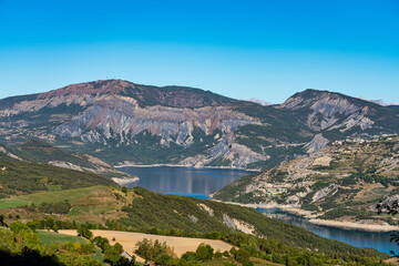 The village Saint Vincent les Forts at Lake Serre-Poncon in France near Gap.