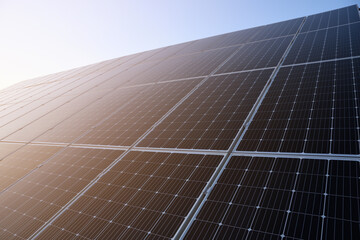 Solar panels against blue sky background.Against The Deep Blue Sky in suny weather