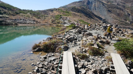 quiet pond in the mountain at Hakuba, Japan, early autumn