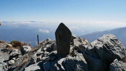 stone monument on the sky at Hakuba, Japan, early autumn