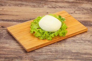 Italian Mozzarella cheese over board
