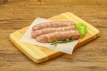 Raw pork meat sausages for grill