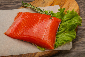 Salmon piece steak served rosemary