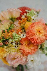 Wedding flowers, bridal bouquet close-up. Decoration of roses, peonies and ornamental plants, close-up, selective focus.