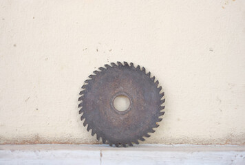 Old circle sharp diamond blade leaning on the wall
