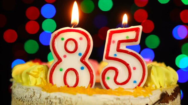 Number 85 Happy Birthday Cake With Burning Candles Topper.