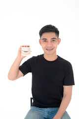 asian guy smile with denture in his hand
