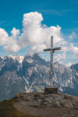 Beautiful alpine view with a summit cross at Leogang, Salzburg, Austria