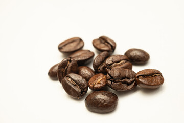 Coffee beans on white background with text