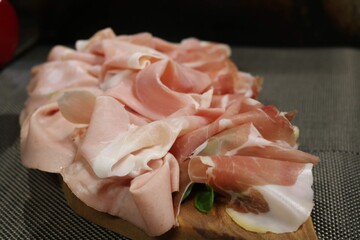 romantic appetizer with ham , cheese and traditional sausages