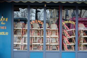 Some tables and chairs piled up in closed Parisian restaurants and cafes during coronavirus pandemic. 4th February 2021.
