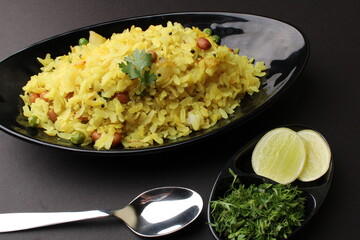 Indian Breakfast aalu Poha Also Know as kande Pohe made up of Beaten Rice or Flattened Rice.