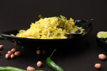 Indian Breakfast aalu Poha Also Know as kande Pohe made up of Beaten Rice or Flattened Rice.