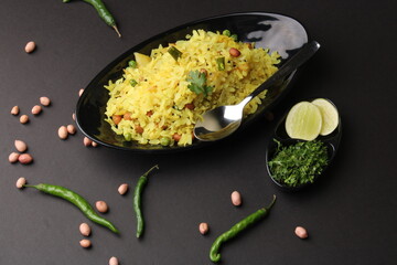Indian Breakfast aalu Poha Also Know as kande Pohe made up of Beaten Rice or Flattened Rice.