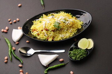 Indian Breakfast aalu Poha Also Know as kande Pohe made up of Beaten Rice or Flattened Rice.