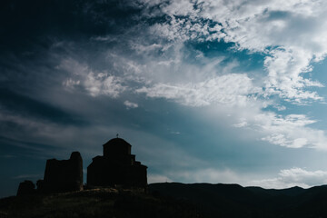 silhouette of an ancient church against the sky