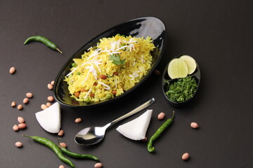 Indian Breakfast aalu Poha Also Know as kande Pohe made up of Beaten Rice or Flattened Rice.