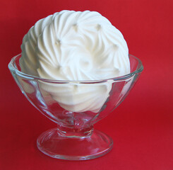 delicious italian dessert white meringues on a pink background