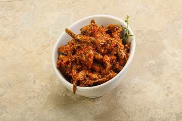 Canned anchovy in tomato sauce