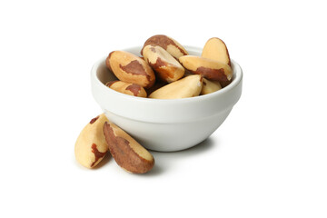 Bowl with brazil nuts isolated on white background