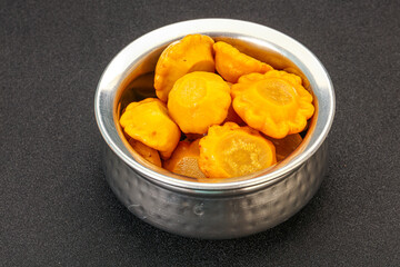 Marinated yellow patisson in the bowl
