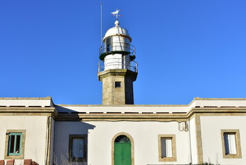 Faro de Lariño or Lariño Lighthouse at Punta Insua in Rias Baixas Region. Coruña, Galicia, Spain.