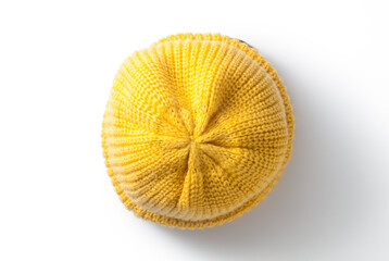 Yellow knitted hat isolated on white background. Top view.