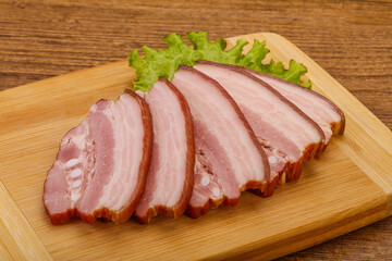 Tasty smoked pork brisket slice