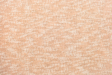 Fototapeta na wymiar Woven surface texture. Background, wallpaper in pastel colors. Warm fabric.