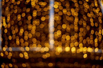 Gold glitter night bokeh as a background.
