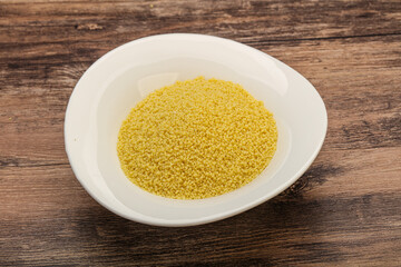 Raw cous cous heap in the bowl