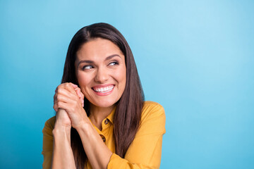 Fototapeta premium Portrait of attractive person folded arms palms look empty space beaming smile isolated on blue color background