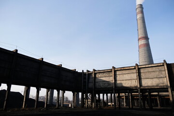 Almaty, Kazakhstan - 02.04.2021 : Smokestack and protective metal structure on the heating plant