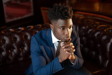 handsome young african man in suit 