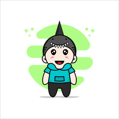 Cute kids character wearing shark costume.