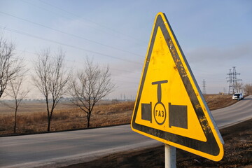 Warning sign with the inscription in Russian: gas