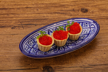 Apetizer - tartlet with red caviar