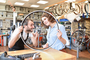 customer and dealer in bicycle shop - purchase and repair of bicycles - customer service