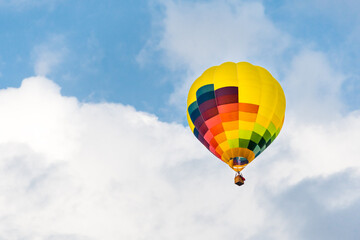 Hot air balloon over the blue sky over Igualada, Spain