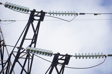 High-voltage power line. Glass insulators and wire fixing.