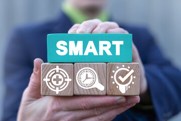 Business concept SMART Goal Setting. Efficient project management method as acronym of specific, measurable, achievable, relevant and timed.