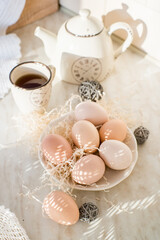 Natural easter eggs on table in the farm. Easter. Farm products. Eco-friendly products
