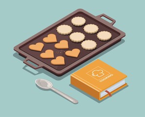 Baking sheet with cookies, recipe book and spoon